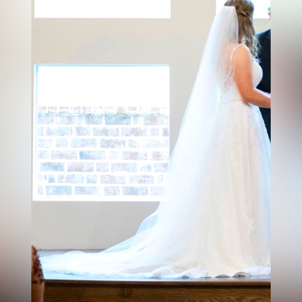 Like new cathedral custom made white wedding veil.